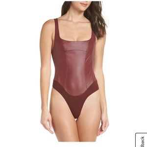Free people she’s a vegan bodysuit